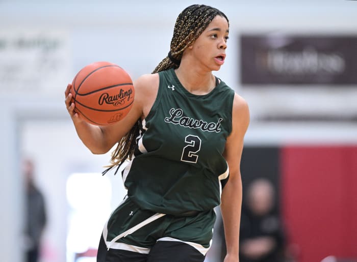 Laurel's Saniyah Hall brings the ball up the floor against Purcell Marian on January 16, 2023.